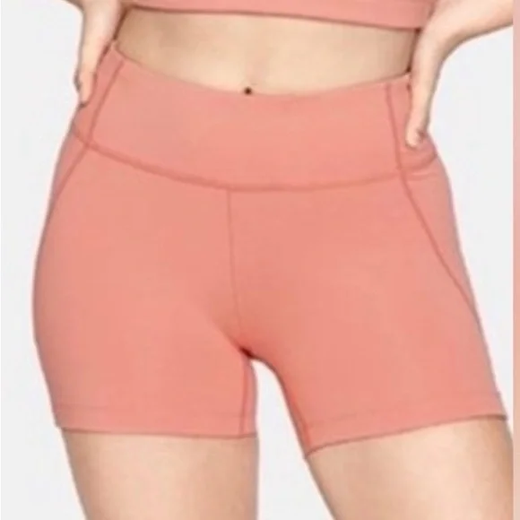 Outdoor Voices Tech Sweat Biker Shorts in Heathered Orange Peach - Picture 2 of 16
